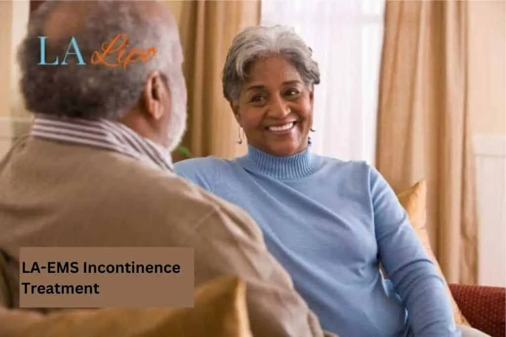 Couple sat smiling at each other - LA-EMS treatment Southampton