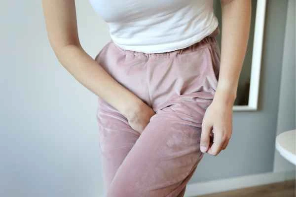 older woman running to the toilet because of urinary incontinence Southampton