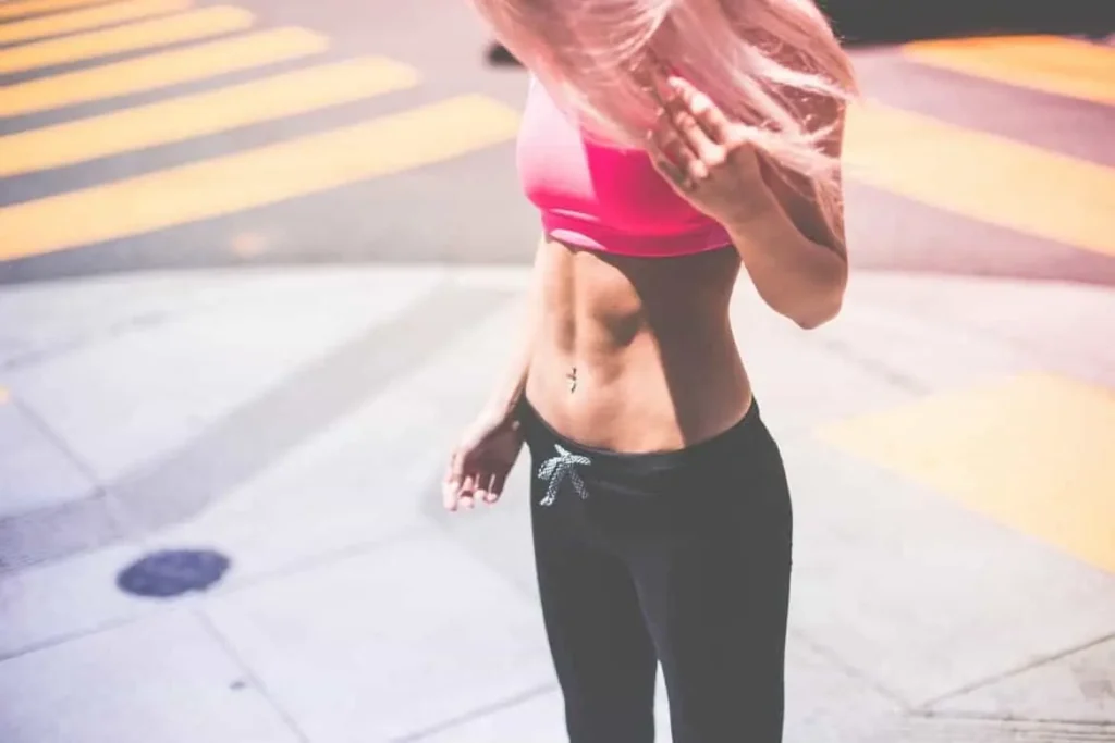 Woman with toned stomach after LA-EMS Body Sculpting Treatment Southampton